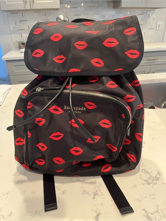 kate spade Handbags - kate spade Black Backpack with Red Lip Print Pattern